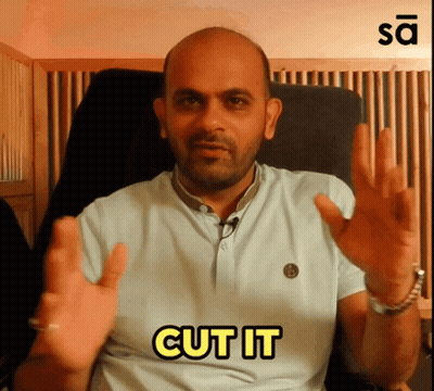 A Man In A Blue Shirt Says Cut It In Yellow GIF