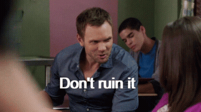 A Man In A Blue Shirt Says " Do N't Ruin It " While Sitting At A Desk GIF