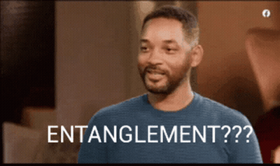 A Man In A Blue Shirt Says " Entanglement ?? " GIF