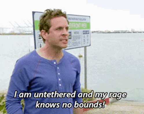 A Man In A Blue Shirt Says " I Am Untethered And My Rage Knows No Bounds ! " GIF