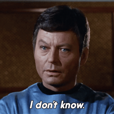 A Man In A Blue Shirt Says " I Don T Know " GIF