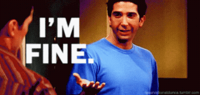 A Man In A Blue Shirt Says " I 'M Fine " In White Letters GIF