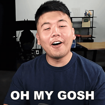 A Man In A Blue Shirt Says " Oh My Gosh " In White Letters GIF
