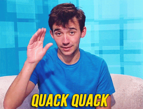 A Man In A Blue Shirt Says Quack Quack In Yellow GIF