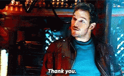 A Man In A Blue Shirt Says Thank You In A Pixelated Image GIF