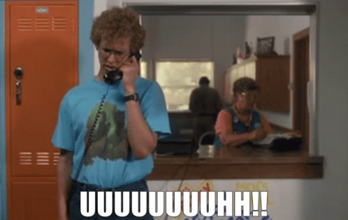 A Man In A Blue Shirt Talking On A Phone With A Caption That Says Uuuuuuuuhh !! GIF