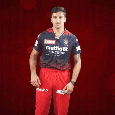 A Man In A Blue Shirt That Says Muthoot Fincorp GIF