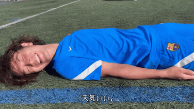 A Man In A Blue Shirt With A Fcb Logo On It GIF