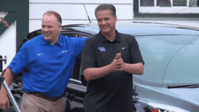 A Man In A Blue Shirt With Kentucky On It GIF