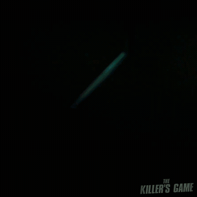 A Man In A Blue Shirt With The Killer 'S Game Written On The Front GIF