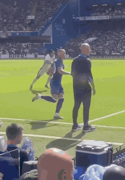 A Man In A Blue Shirt With The Number 10 On It GIF