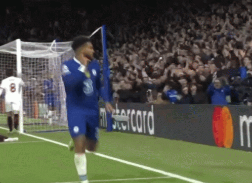 A Man In A Blue Shirt With The Number 8 On It GIF