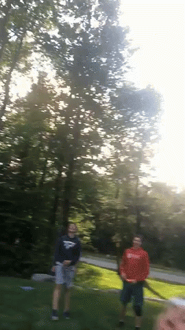 A Man In A Blue Shirt With The Word Eagles On It GIF