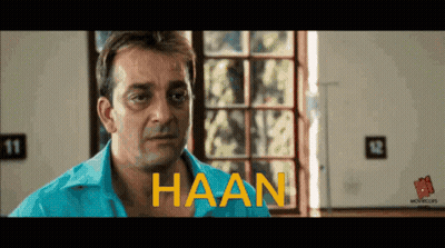 A Man In A Blue Shirt With The Word Haan Written On His Chest GIF