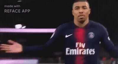 A Man In A Blue Shirt With The Word Paris On It Is Made With Reface App GIF