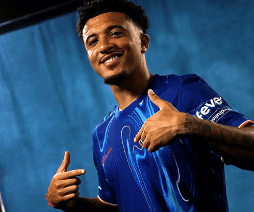A Man In A Blue Shirt With The Word Reve On The Sleeve GIF