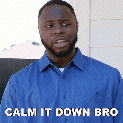 A Man In A Blue Shirt With The Words Calm It Down Bro On The Bottom GIF