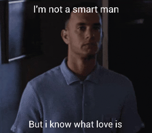 A Man In A Blue Shirt With The Words " I 'M Not A Smart Man But I Know What Love Is " GIF