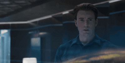A Man In A Blue Shirt With The Words Let 'S Go Get This Son Of A Bitch Behind Him GIF