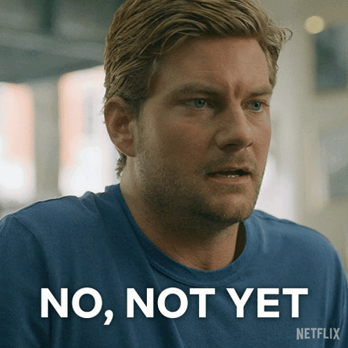 A Man In A Blue Shirt With The Words No Not Yet On The Bottom GIF