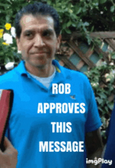 A Man In A Blue Shirt With The Words Rob Approves This Message GIF