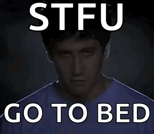 A Man In A Blue Shirt With The Words Stfu Go To Bed Above Him GIF