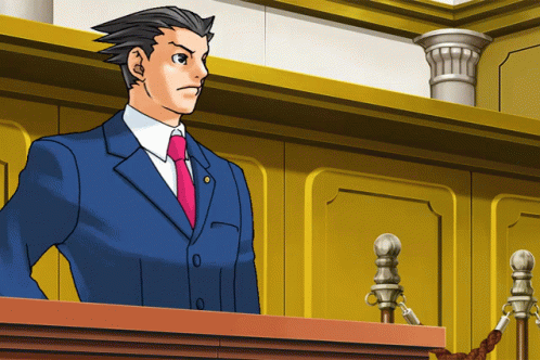 A Man In A Blue Suit And Red Tie Stands At A Podium GIF