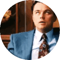 A Man In A Blue Suit And Tie Is Looking Up Sticker