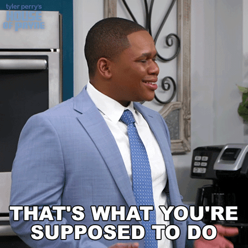 A Man In A Blue Suit And Tie Says " That 'S What You 'Re Supposed To Do " GIF