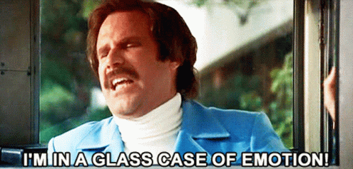 A Man In A Blue Suit And White Turtleneck Says I 'M In A Glass Case Of Emotion GIF