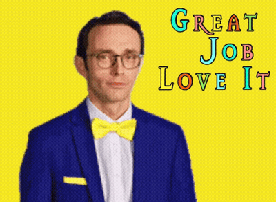 A Man In A Blue Suit And Yellow Bow Tie Giving The Middle Finger With The Words Great Job Love It Behind Him GIF