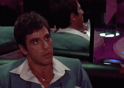 A Man In A Blue Suit Has The Word Order Written On His Face GIF