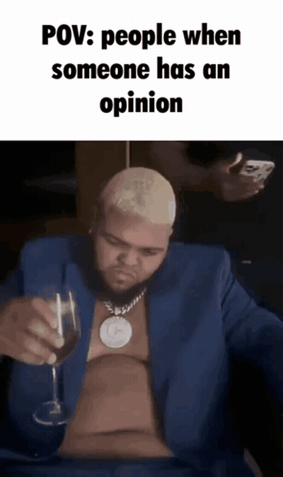 A Man In A Blue Suit Is Holding A Glass Of Wine With The Caption Pov : People When Someone Has An Opinion GIF