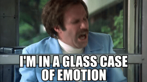 A Man In A Blue Suit Is Screaming And Says I 'M In A Glass Case Of Emotion GIF