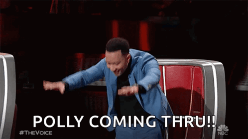 A Man In A Blue Suit Is Sitting In A Chair With His Arms Outstretched . GIF