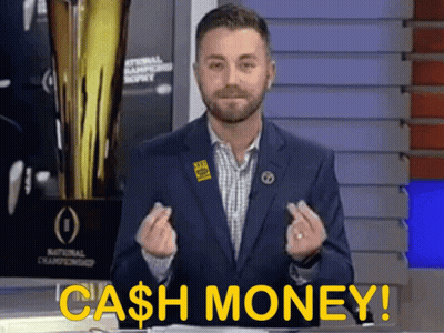 A Man In A Blue Suit Says Cash Money GIF