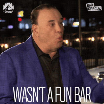 A Man In A Blue Suit With The Words Wasn T A Fun Bar GIF