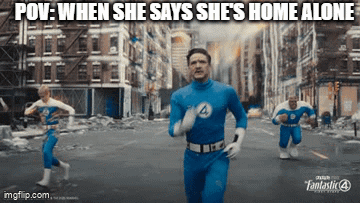 A Man In A Blue Superhero Costume Is Running Down A City Street GIF
