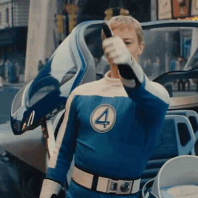 A Man In A Blue Superhero Costume With The Number Four On His Chest GIF