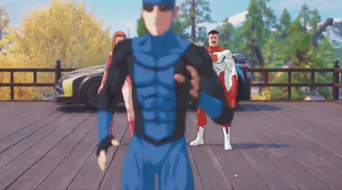A Man In A Blue Superhero Suit Is Standing On A Deck GIF