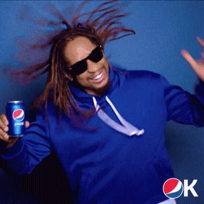 A Man In A Blue Sweatshirt Holds A Can Of Pepsi GIF