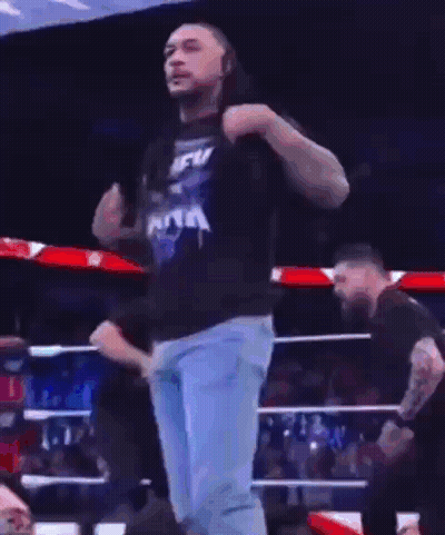 A Man In A Blue T-Shirt That Says New York Is Dancing In A Ring GIF