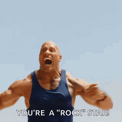 A Man In A Blue Tank Top Is Screaming That He Is A Rock Star GIF