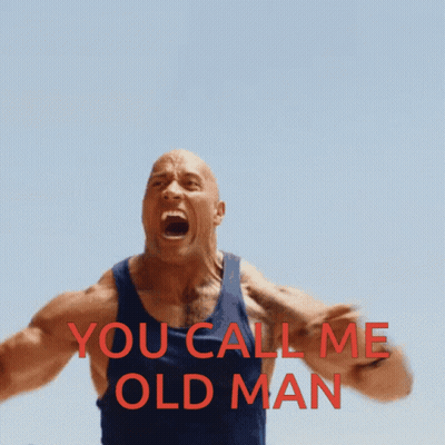 A Man In A Blue Tank Top Is Screaming With The Words You Call Me Old Man Above Him GIF