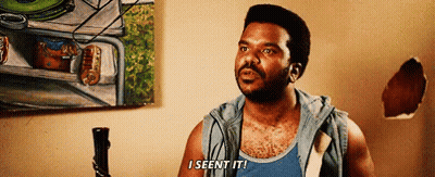 A Man In A Blue Tank Top Says I Seen It In Front Of A Painting GIF