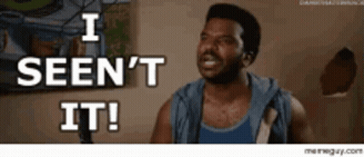 A Man In A Blue Tank Top Says " I Seen 'T It ! " GIF