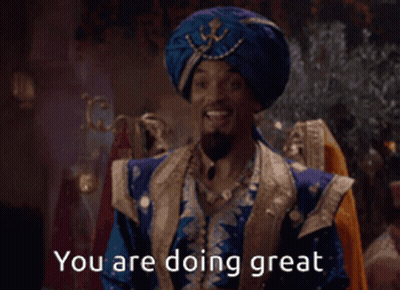 A Man In A Blue Turban Is Smiling And Says You Are Doing Great GIF