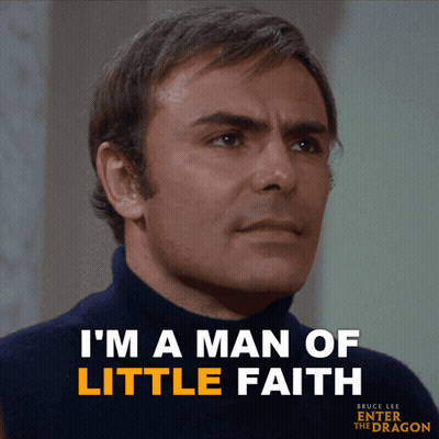 A Man In A Blue Turtleneck Sweater Says I 'M A Man Of Little Faith GIF