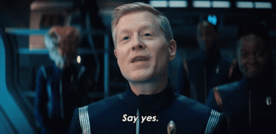 A Man In A Blue Uniform Says Yes GIF