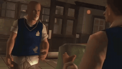 A Man In A Blue Vest With A Crest On It Stands Next To Another Man GIF